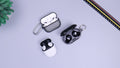 White wireless earbuds with case