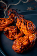 Black digital air fryer on counter