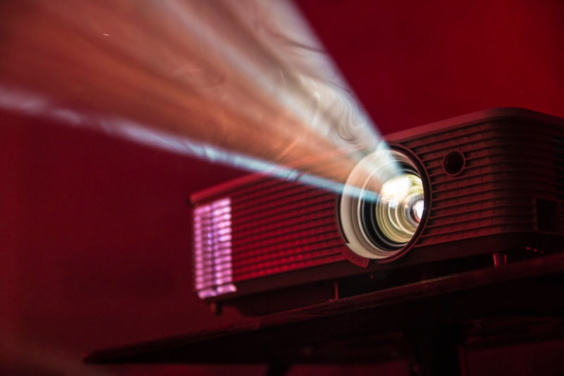 LuminaTech Smart 4K Portable Projector rendering high resolution home theater movie
