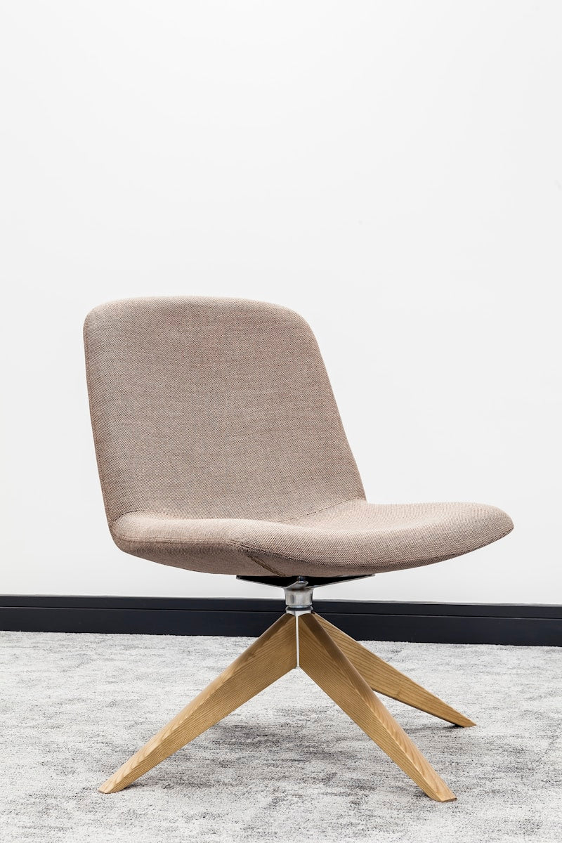 Ergonomic black mesh office chair in modern workspace